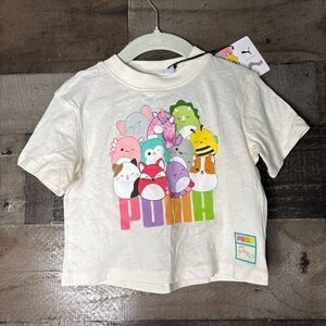 Puma Kids Cream Tee with Colorful Character Stack Graphic